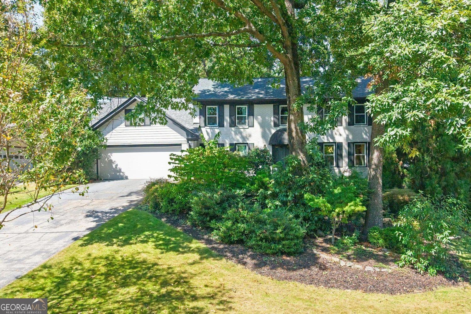 6 bedroom, 4 bathroom, 4,083 sq ft single family residence for sale at 5142 Corners Drive, Atlanta, GA 30338 — photo 1 of 53