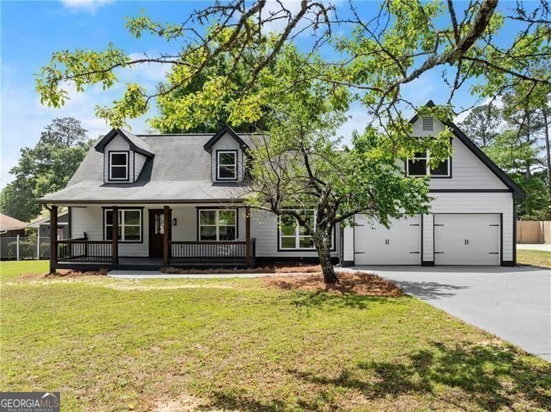 4 bedroom, 3 bathroom, 1,852 sq ft single family residence for sale at 2979 Overwood Lane, Snellville, GA 30078 — photo 3