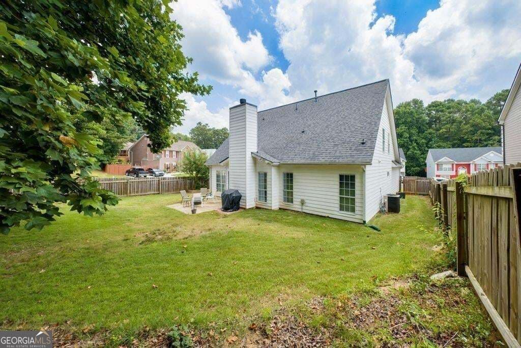4 bedroom, 2.5 bathroom, 1,810 sq ft single family residence for sale at 225 Shadetree Lane, Lawrenceville, GA 30044 — photo 9