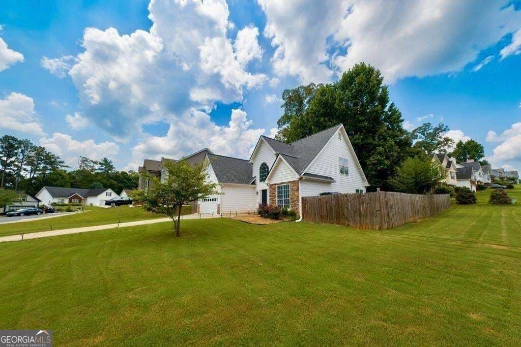 4 bedroom, 2.5 bathroom, 1,810 sq ft single family residence for sale at 225 Shadetree Lane, Lawrenceville, GA 30044 — photo 4
