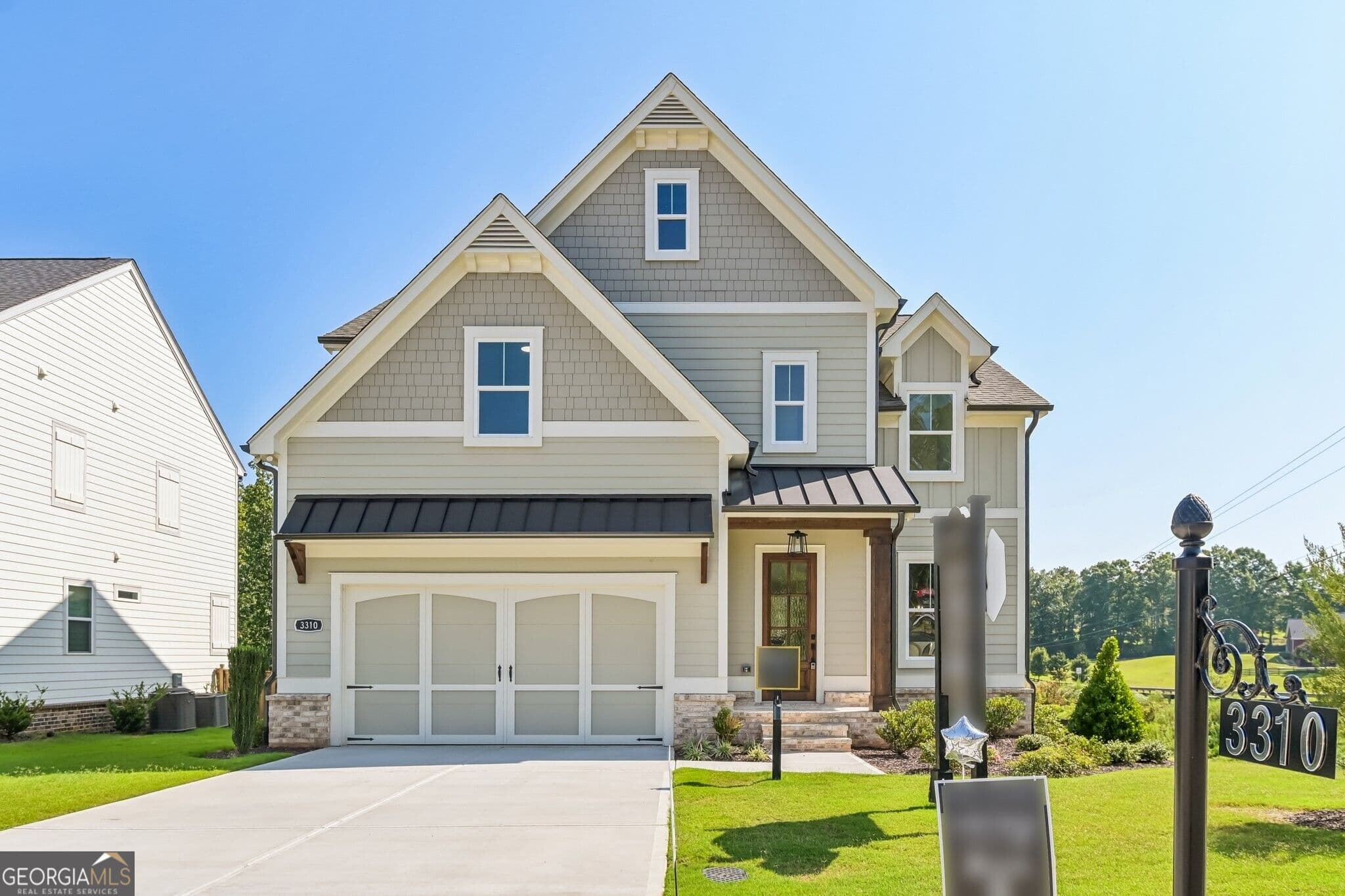 5 bedroom, 4 bathroom, 3,199 sq ft single family residence for sale at 3310 Hillshire Drive, Cumming, GA 30028 — photo 2