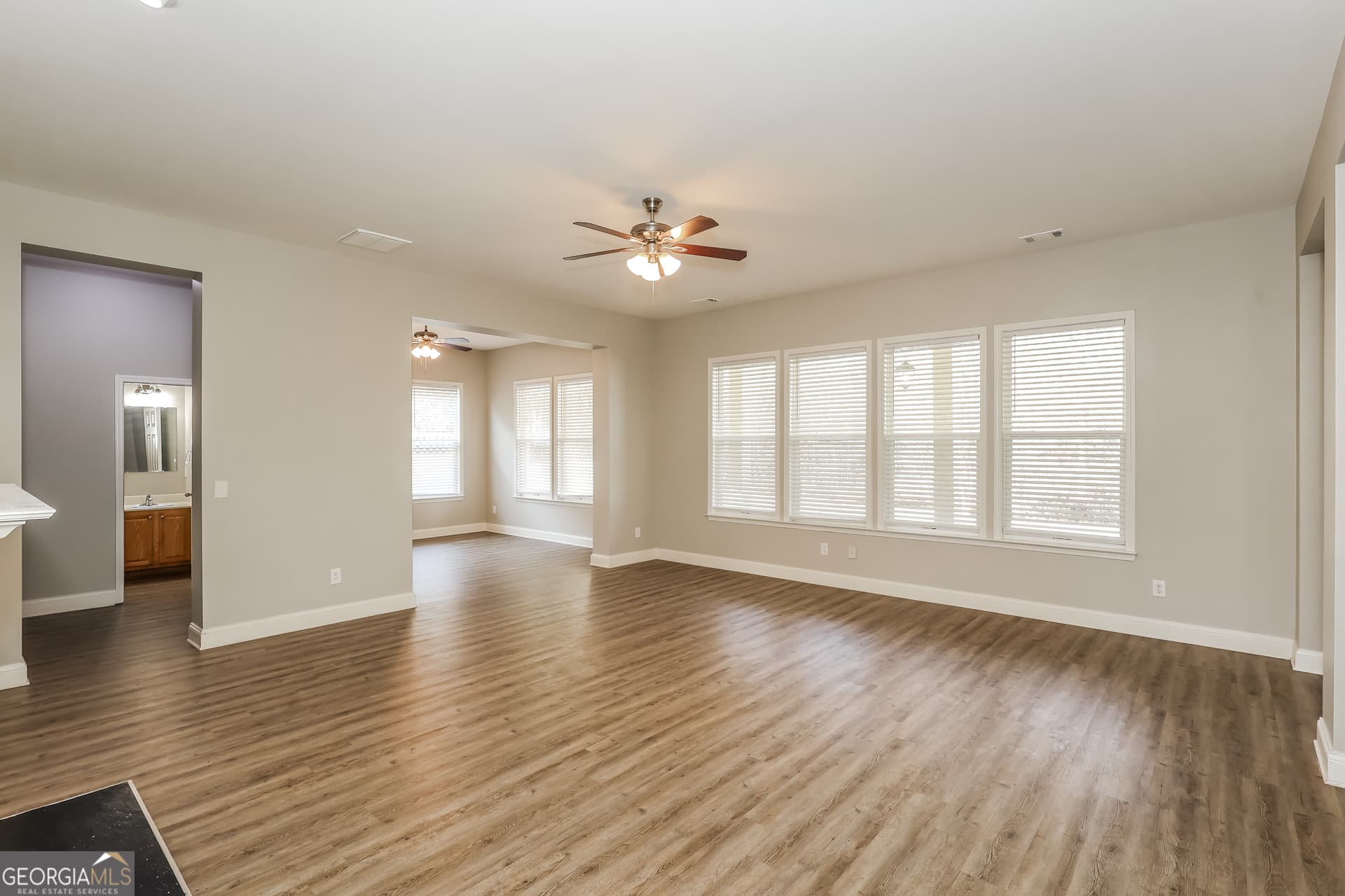 4 bedroom, 3 bathroom, 4,272 sq ft single family residence for sale at 7461 Mistydawn Drive, Fairburn, GA 30213 — photo 2