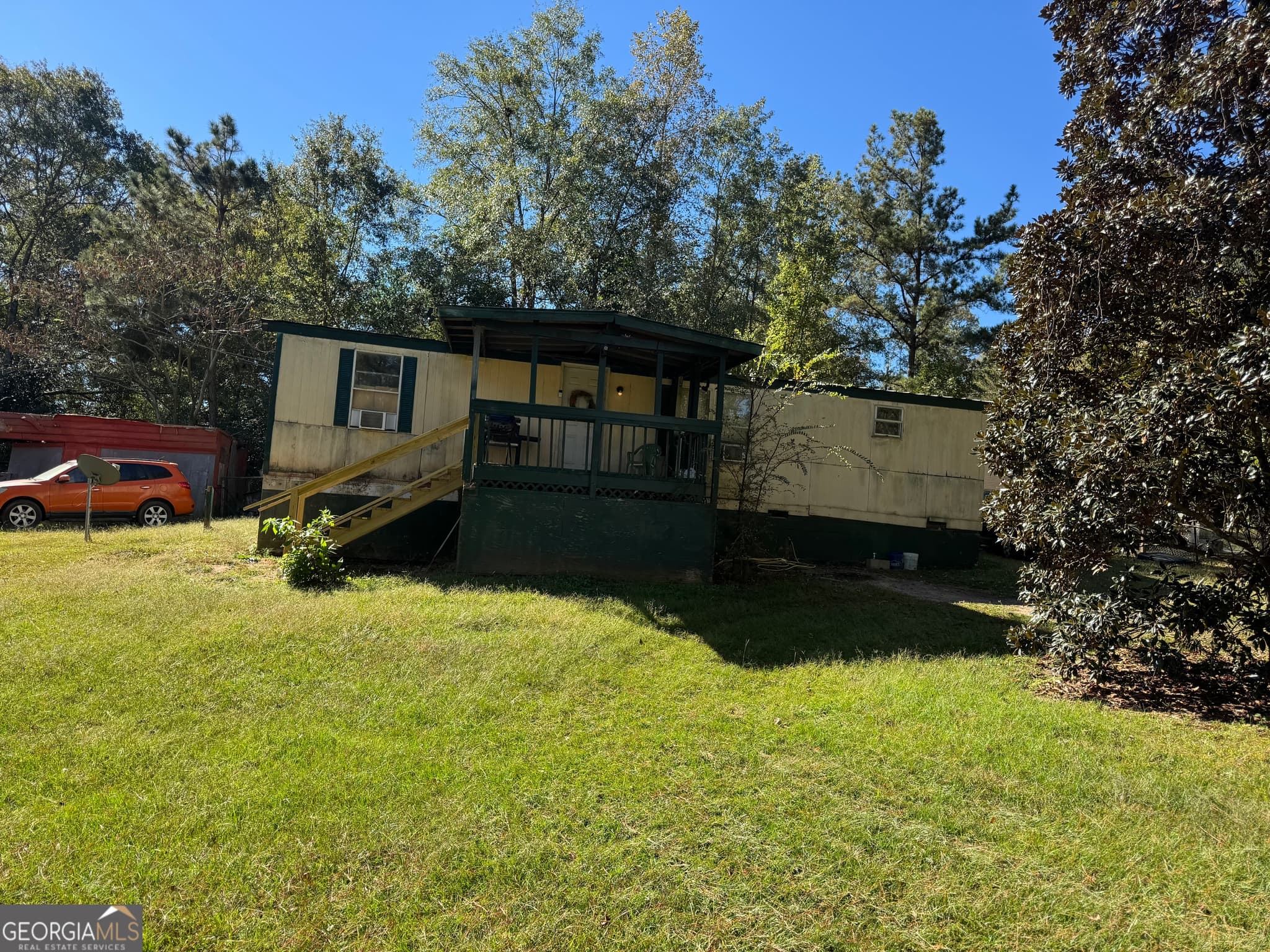3 bedroom, 2 bathroom, 1,056 sq ft manufactured home,single family residence for sale at 106 3rd Street, Milledgeville, GA 31061 — photo 2