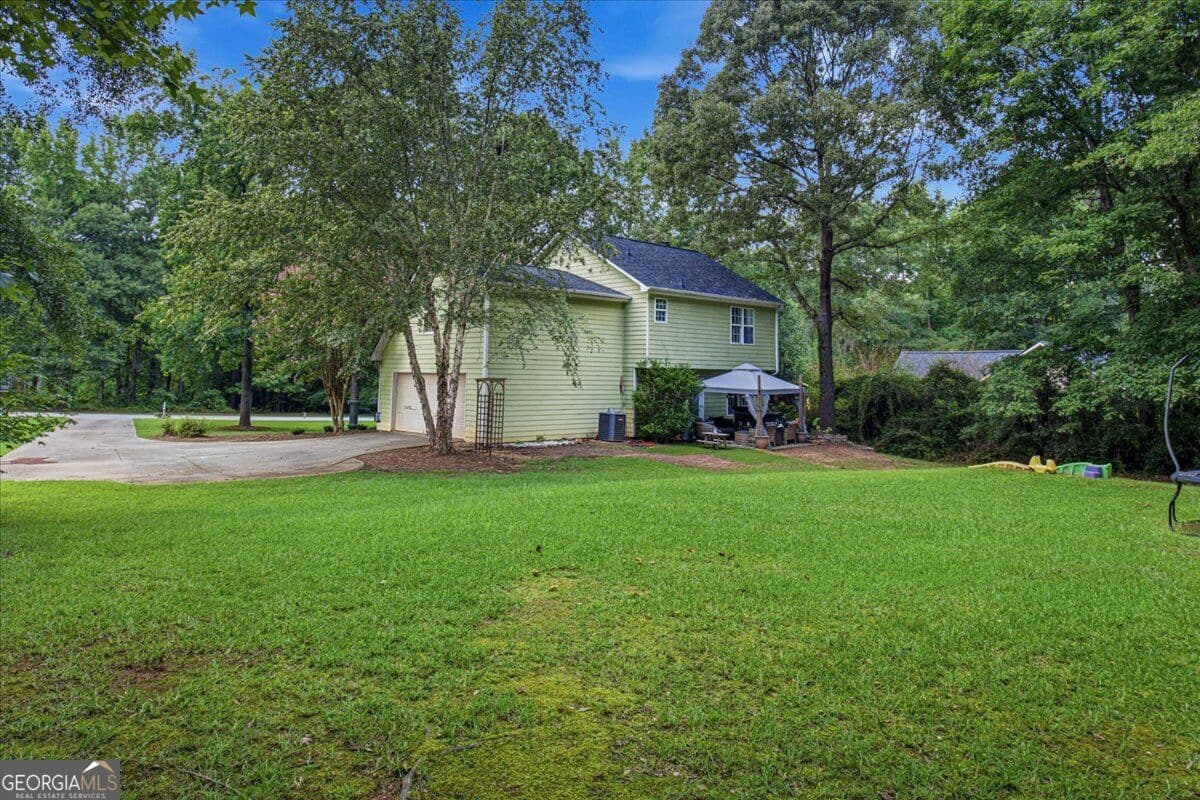 4 bedroom, 2.5 bathroom, 1,672 sq ft single family residence for sale at 110 Alcovy Way, Covington, GA 30014 — photo 7