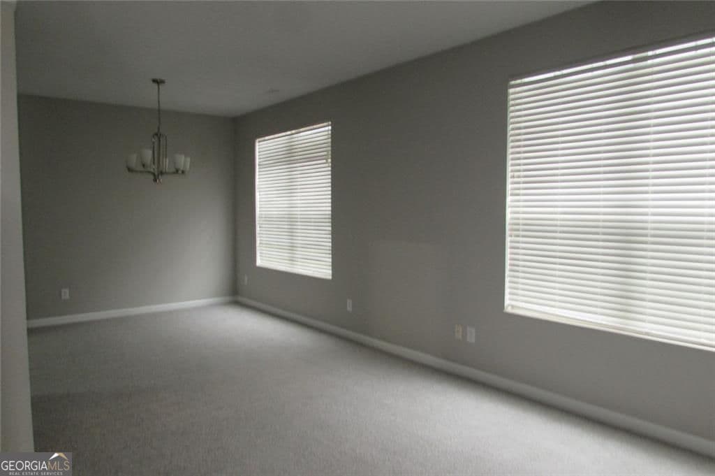 3 bedroom, 2.5 bathroom, 1,918 sq ft single family residence for sale at 5901 Ravensway Drive, Lithonia, GA 30058 — photo 3