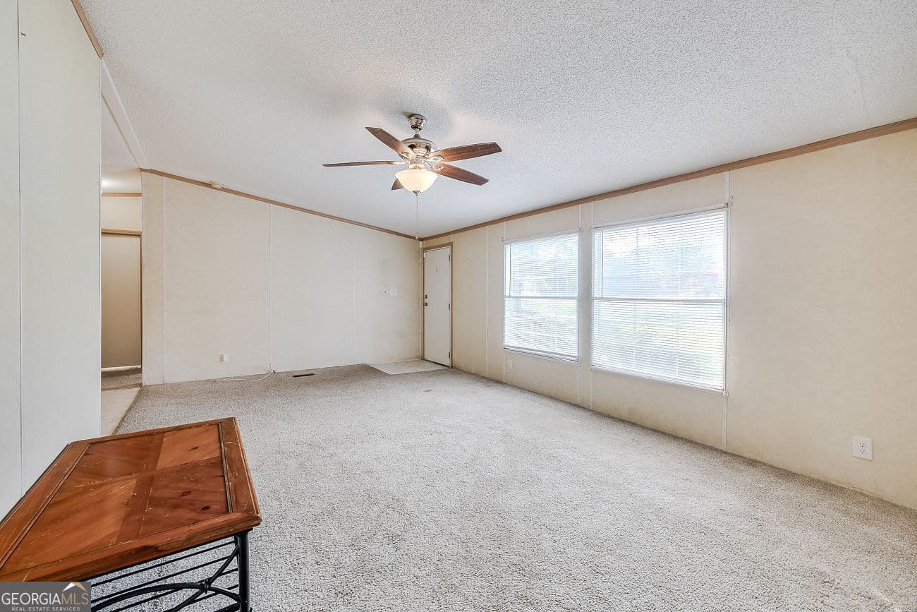 3 bedroom, 2 bathroom, 1,456 sq ft manufactured home,single family residence for sale at 437 Burkhalter Circle, Claxton, GA 30417 — photo 6