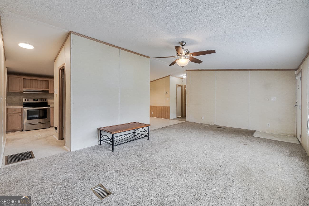 3 bedroom, 2 bathroom, 1,456 sq ft manufactured home,single family residence for sale at 437 Burkhalter Circle, Claxton, GA 30417 — photo 5