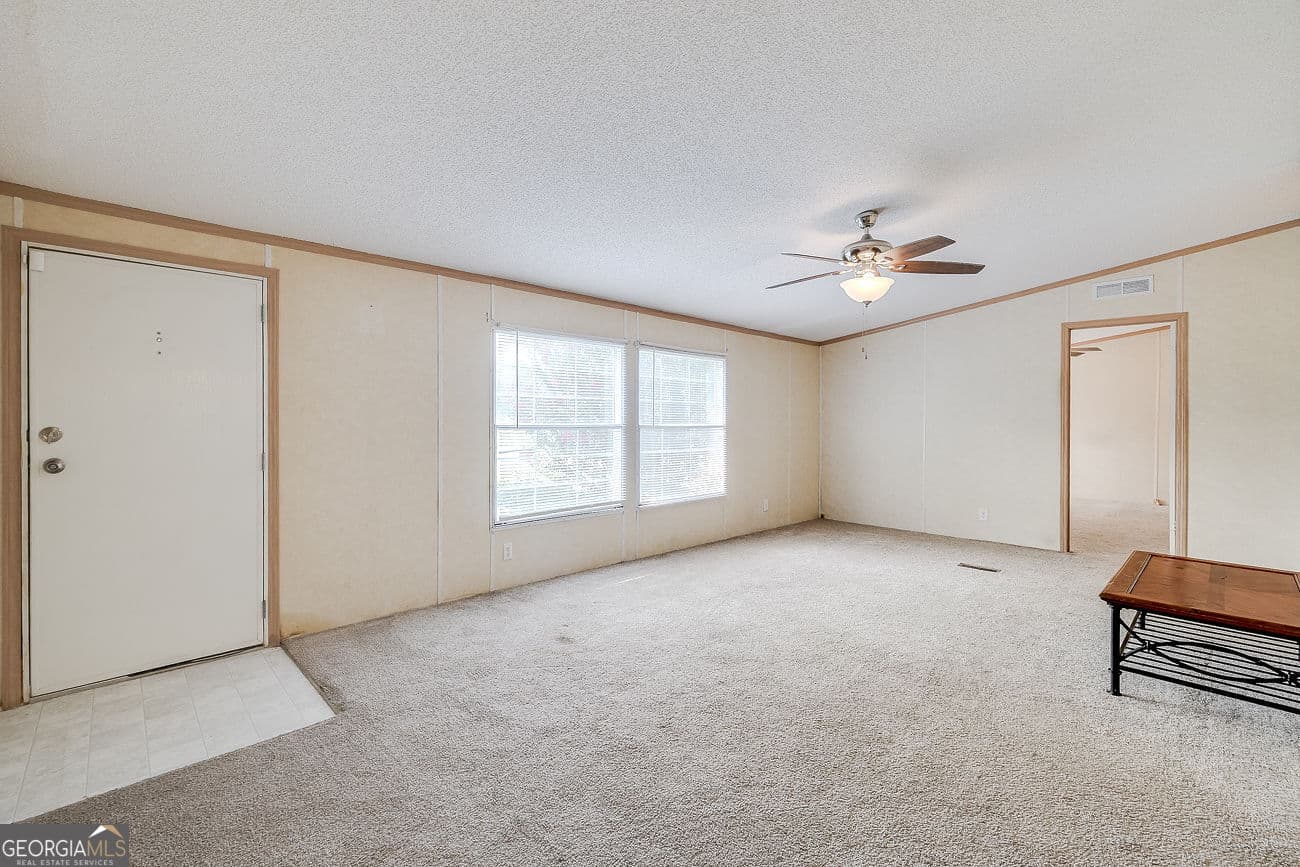 3 bedroom, 2 bathroom, 1,456 sq ft manufactured home,single family residence for sale at 437 Burkhalter Circle, Claxton, GA 30417 — photo 4