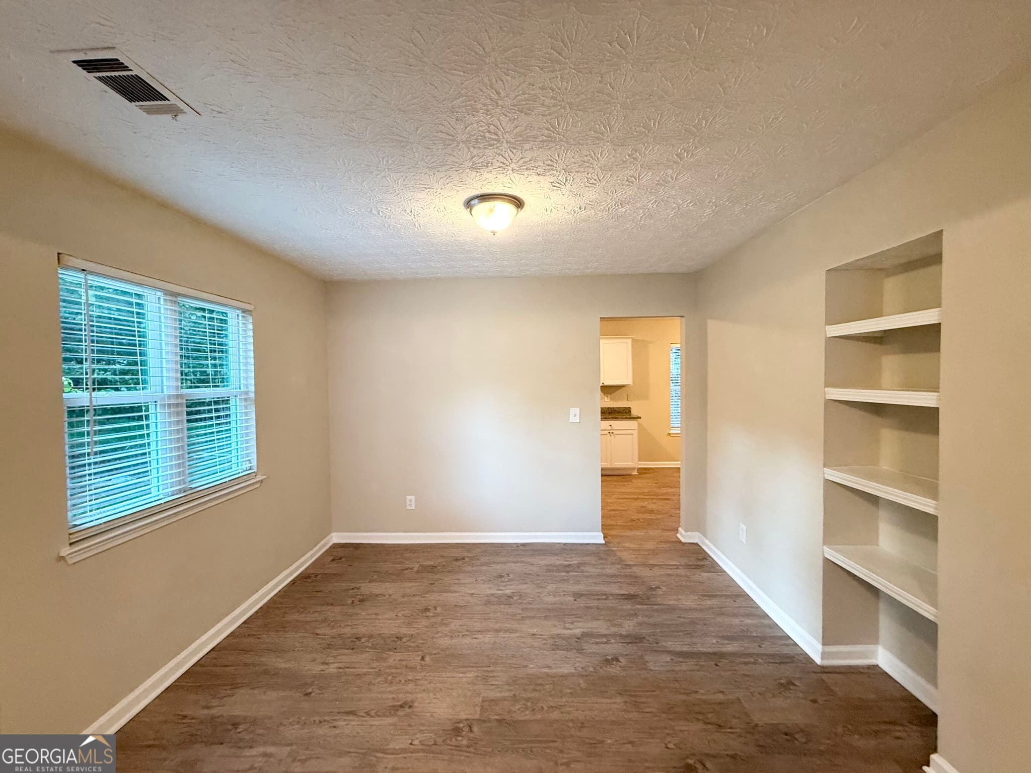 4 bedroom, 2.5 bathroom, 1,688 sq ft single family residence for sale at 3920 Melanie Woods Drive, South Fulton, GA 30349 — photo 6