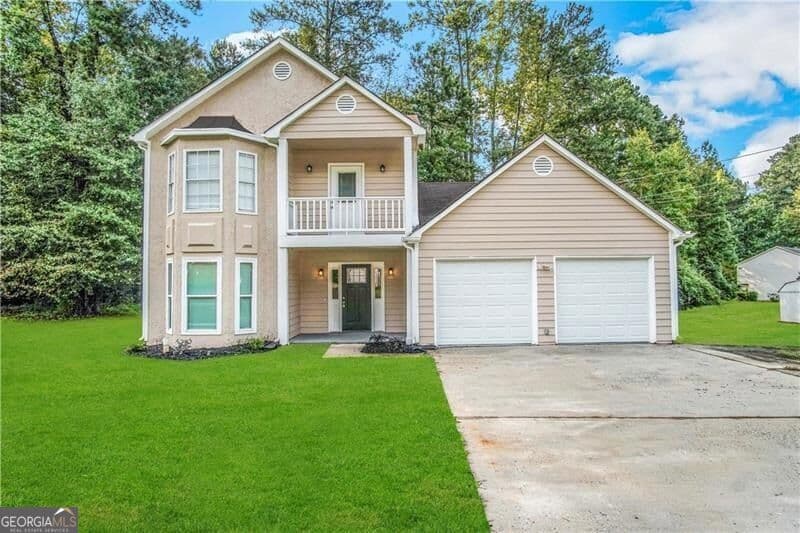 4 bedroom, 2.5 bathroom, 1,688 sq ft single family residence for sale at 3920 Melanie Woods Drive, South Fulton, GA 30349 — photo 1 of 25