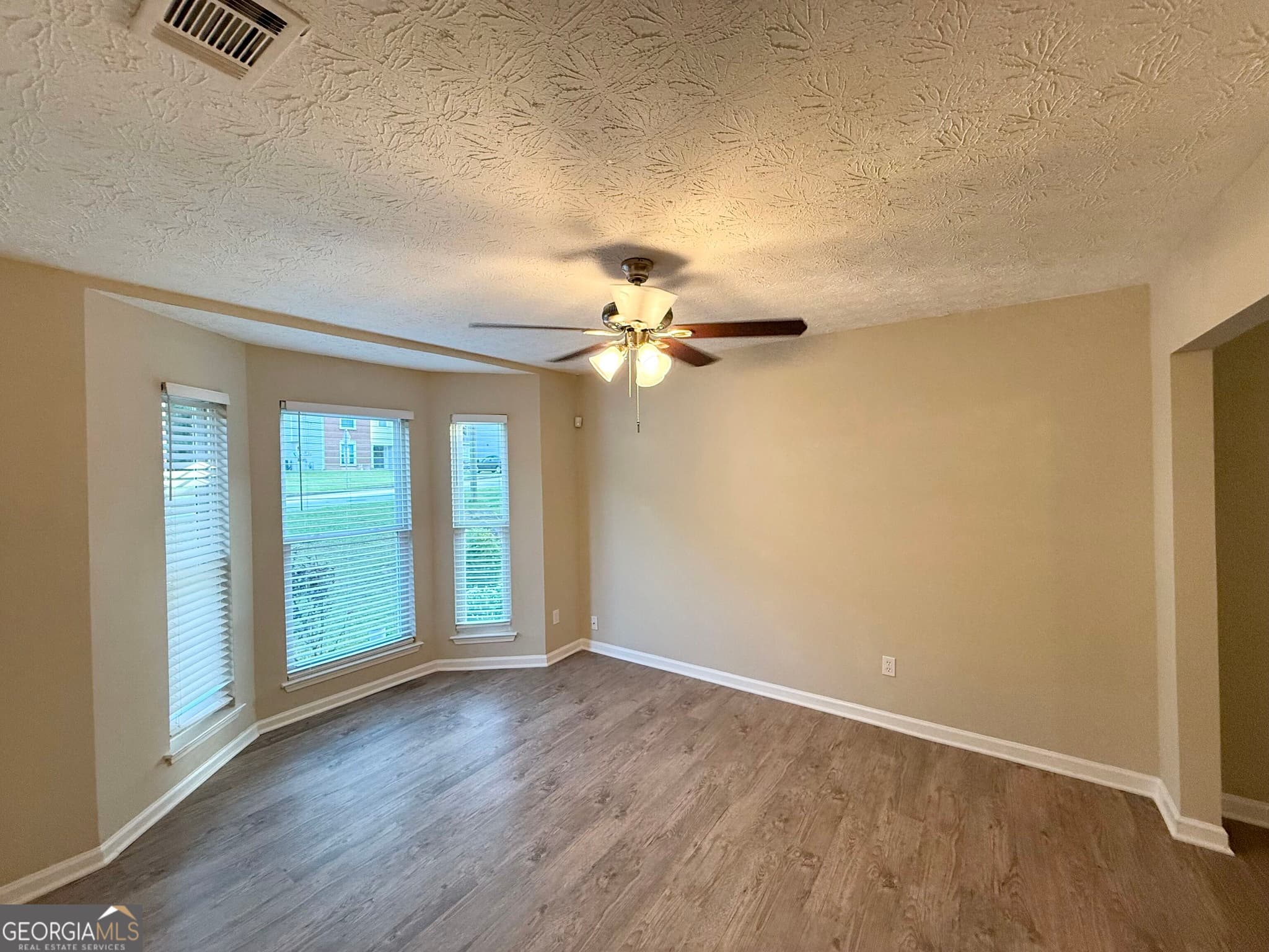 4 bedroom, 2.5 bathroom, 1,688 sq ft single family residence for sale at 3920 Melanie Woods Drive, South Fulton, GA 30349 — photo 5