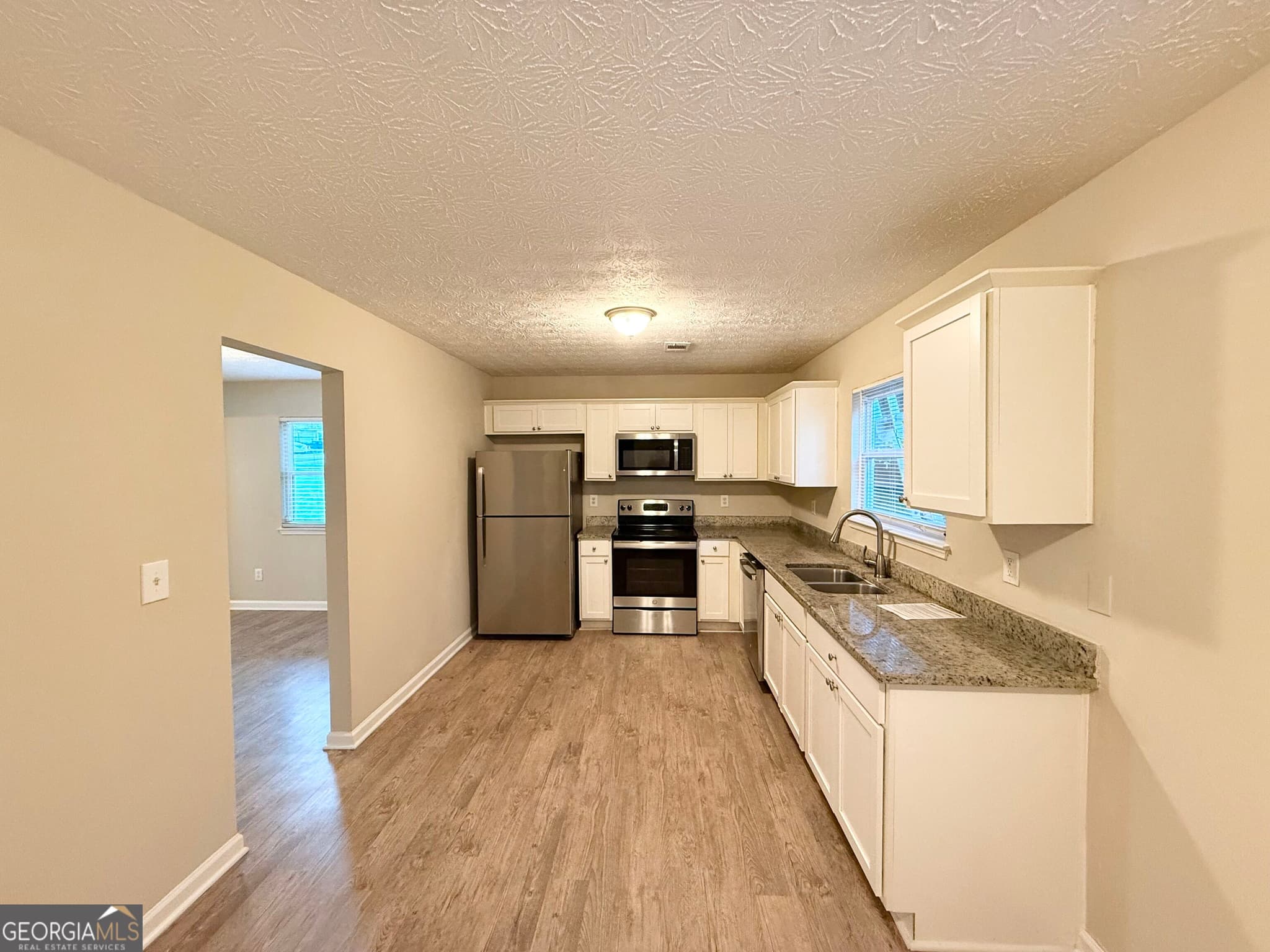 4 bedroom, 2.5 bathroom, 1,688 sq ft single family residence for sale at 3920 Melanie Woods Drive, South Fulton, GA 30349 — photo 8