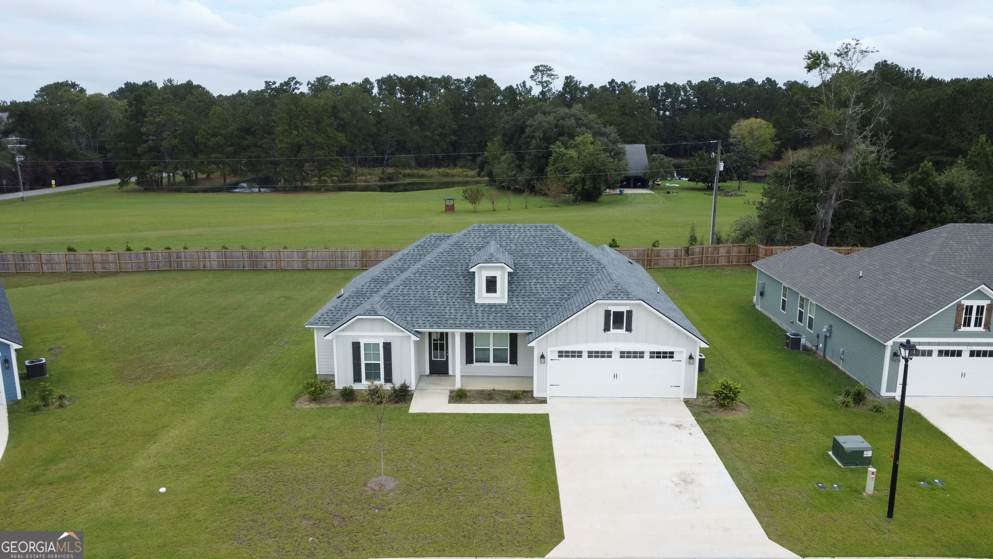 4 bedroom, 2 bathroom, 1,658 sq ft single family residence for sale at 311 McNeal Heritage Circle, Hahira, GA 31632 — photo 2