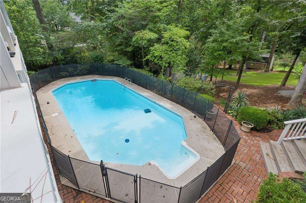 4 bedroom, 3.5 bathroom, 3,262 sq ft single family residence for sale at 3825 Creekview Drive, Marietta, GA 30068 — photo 2