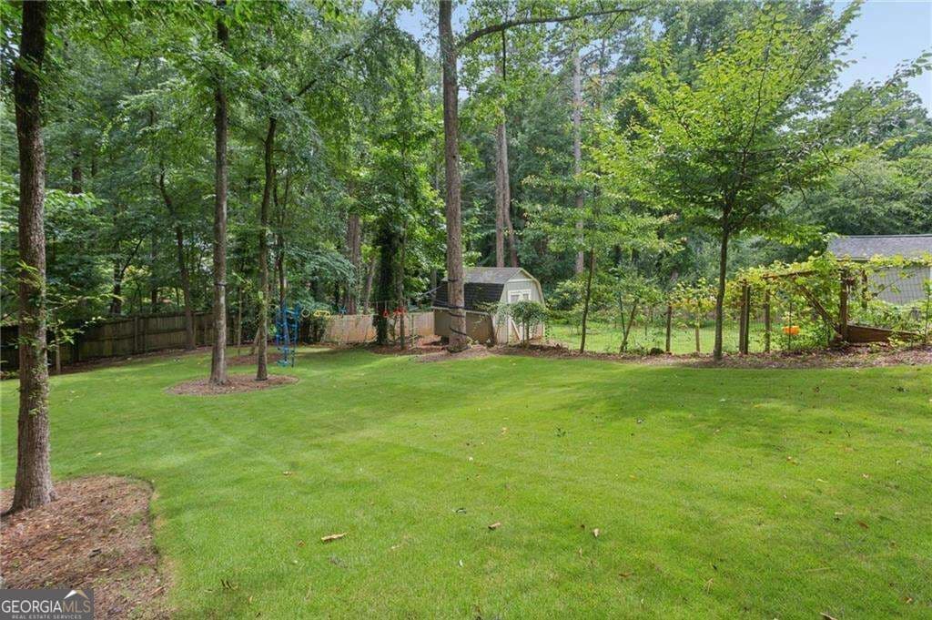 4 bedroom, 3.5 bathroom, 3,262 sq ft single family residence for sale at 3825 Creekview Drive, Marietta, GA 30068 — photo 3