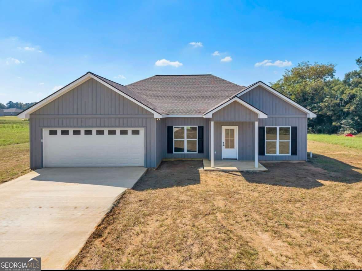 4 bedroom, 2 bathroom, 1,700 sq ft single family residence for sale at 1229 Mark Wood Road, Dexter, GA 31019 — photo 2