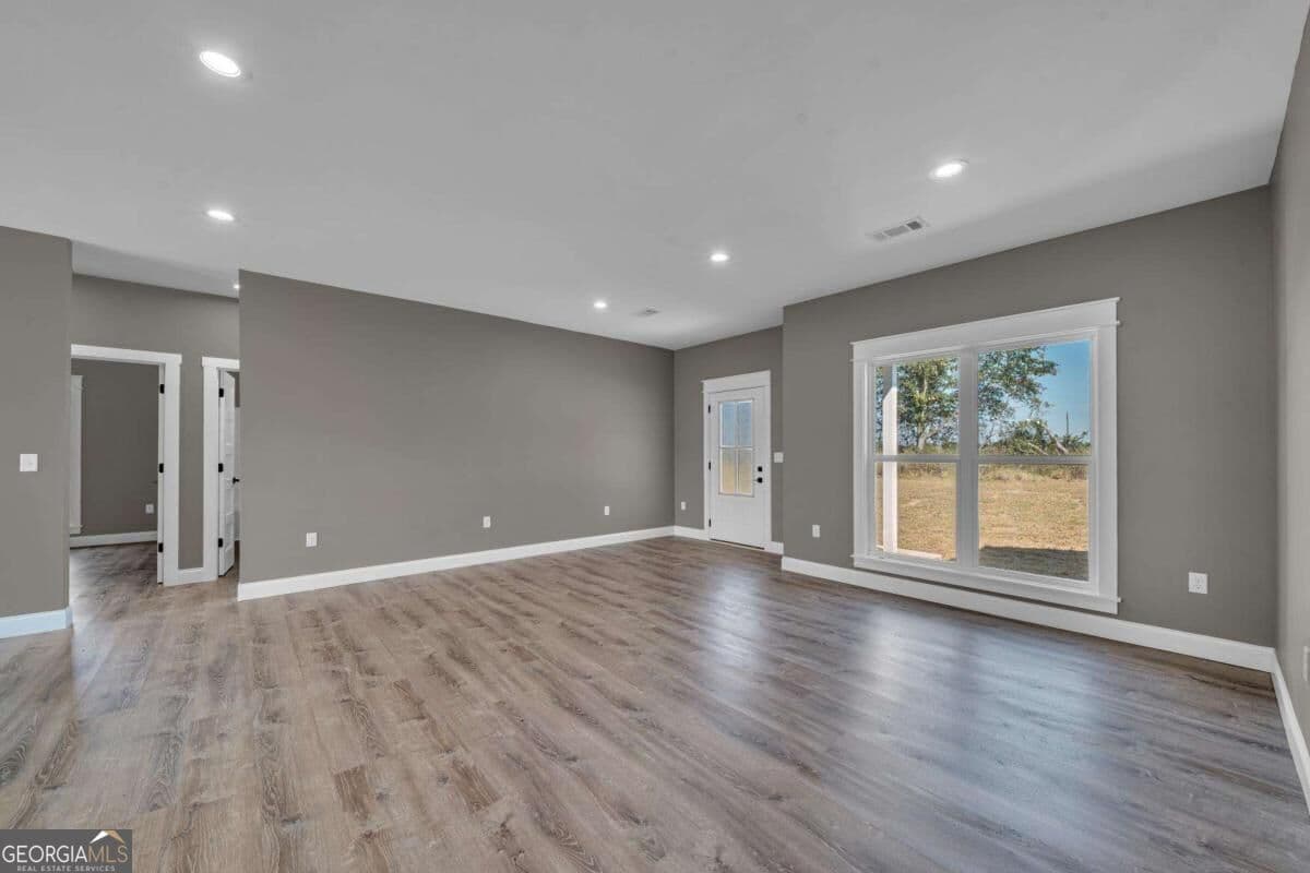 4 bedroom, 2 bathroom, 1,700 sq ft single family residence for sale at 1229 Mark Wood Road, Dexter, GA 31019 — photo 6