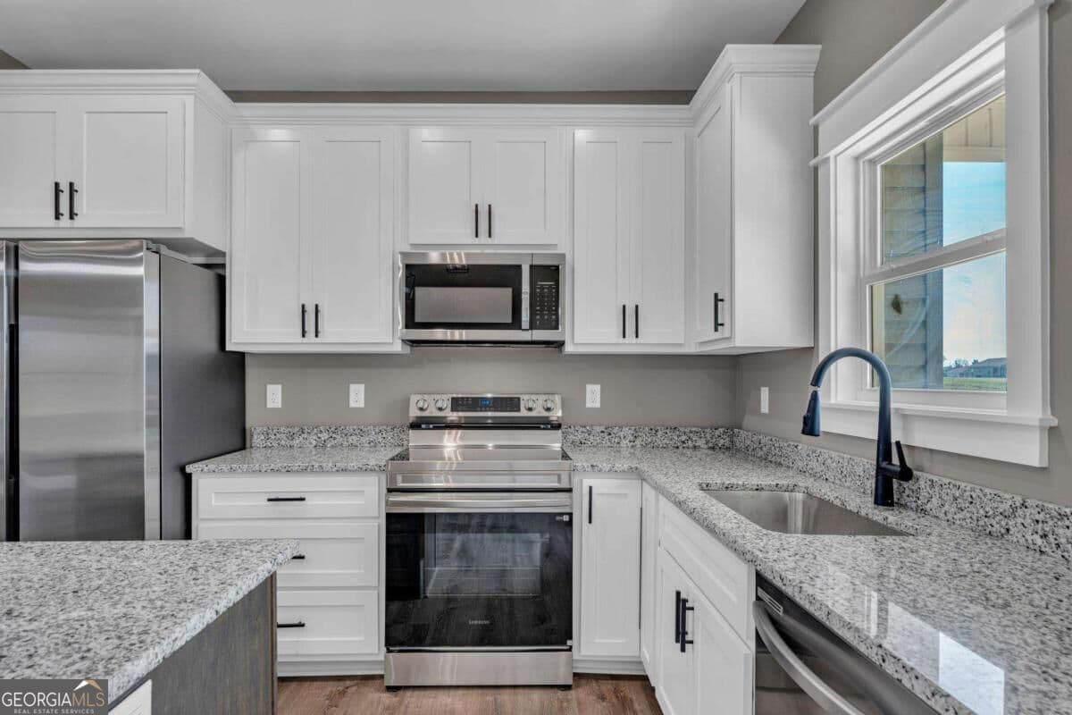 4 bedroom, 2 bathroom, 1,700 sq ft single family residence for sale at 1229 Mark Wood Road, Dexter, GA 31019 — photo 9