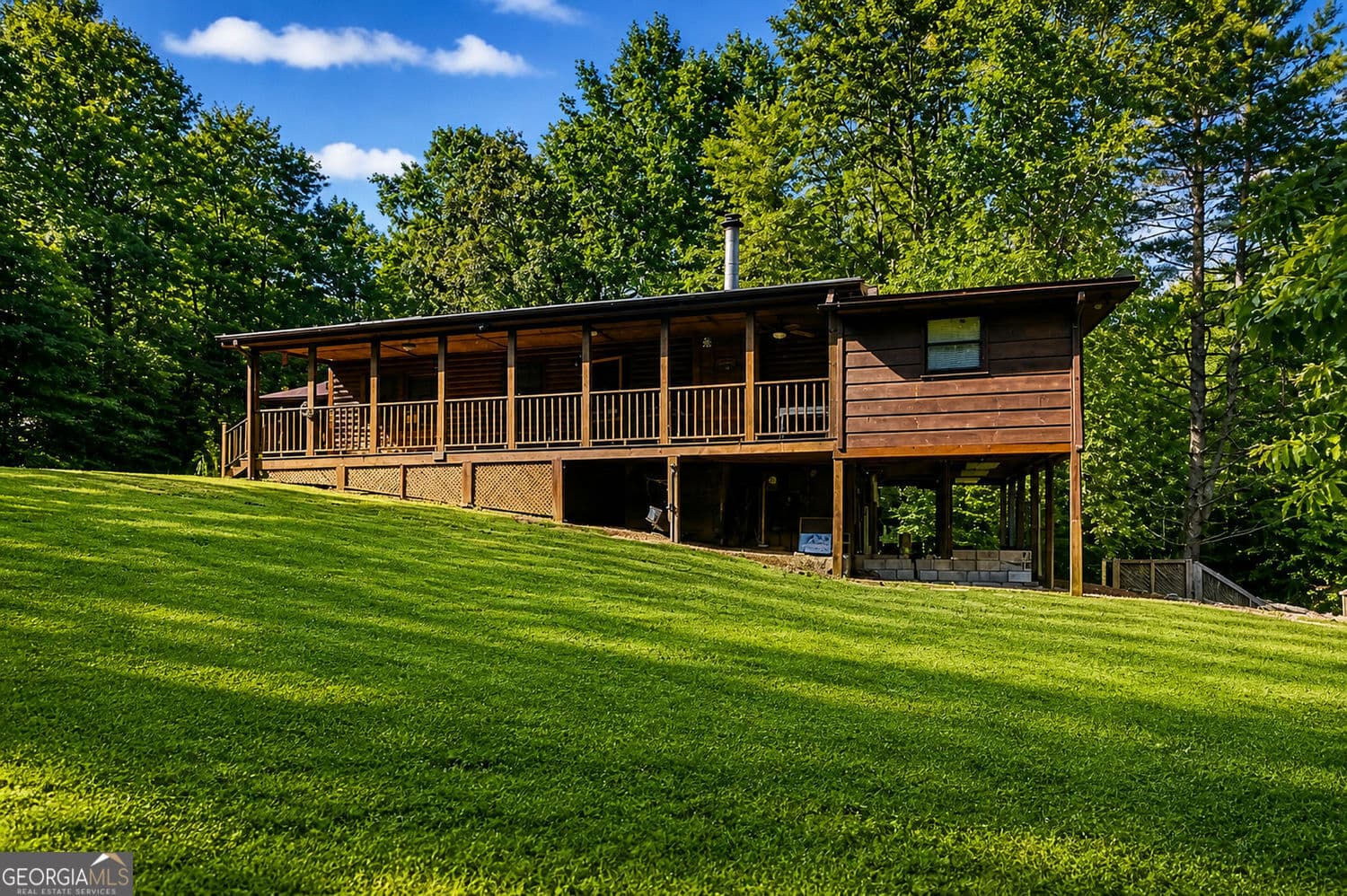 5 bedroom, 2 bathroom, 3,472 sq ft single family residence for sale at 711 ARP Road, Mineral Bluff, GA 30559 — photo 2