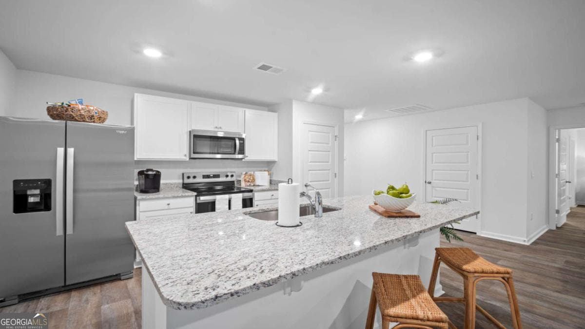 4 bedroom, 2 bathroom, 1,497 sq ft single family residence for sale at 117 Serenoa Drive, Guyton, GA 31312 — photo 6
