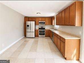 4 bedroom, 2 bathroom, 2,352 sq ft single family residence for sale at 6692 Cambridge Drive, Rex, GA 30273 — photo 2