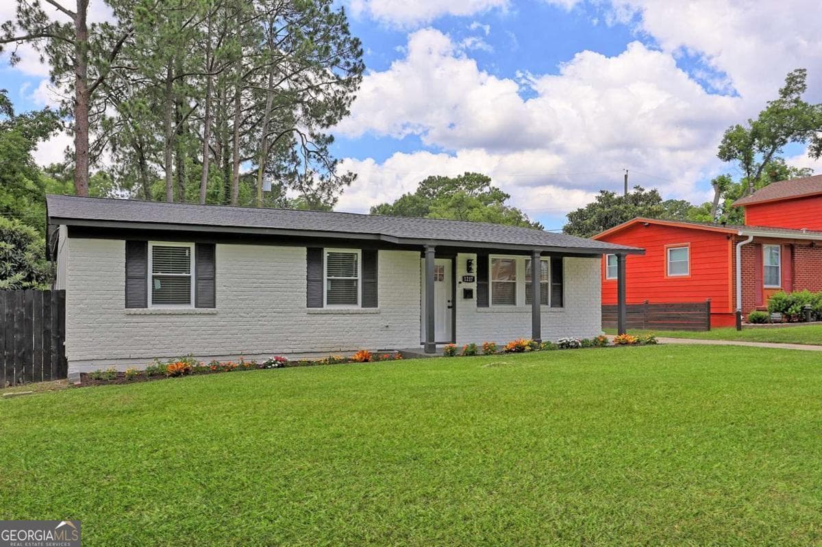 4 bedroom, 2.5 bathroom, 1,677 sq ft single family residence for sale at 1217 E 34Th Street, Savannah, GA 31404 — photo 4