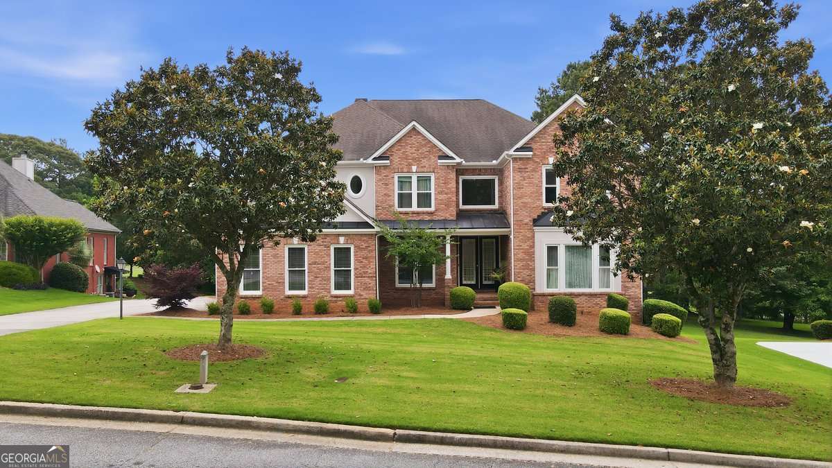 5 bedroom, 4 bathroom, 4,634 sq ft single family residence for sale at 705 Masters Drive, Stone Mountain, GA 30087 — photo 2