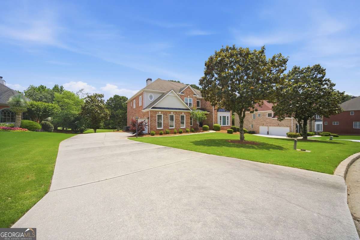 5 bedroom, 4 bathroom, 4,634 sq ft single family residence for sale at 705 Masters Drive, Stone Mountain, GA 30087 — photo 3