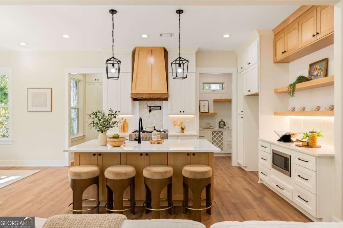 4 bedroom, 3.5 bathroom, 2,930 sq ft single family residence for sale at 3125 Spain Road, Snellville, GA 30039 — photo 2