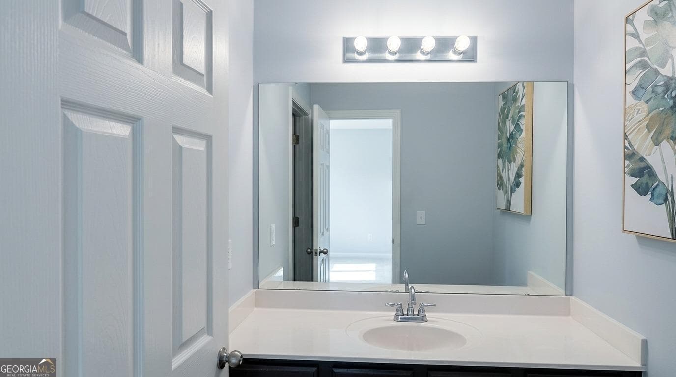 4 bedroom, 2.5 bathroom, 2,454 sq ft single family residence for sale at 5087 Upper Elm Street, Atlanta, GA 30349 — photo 8