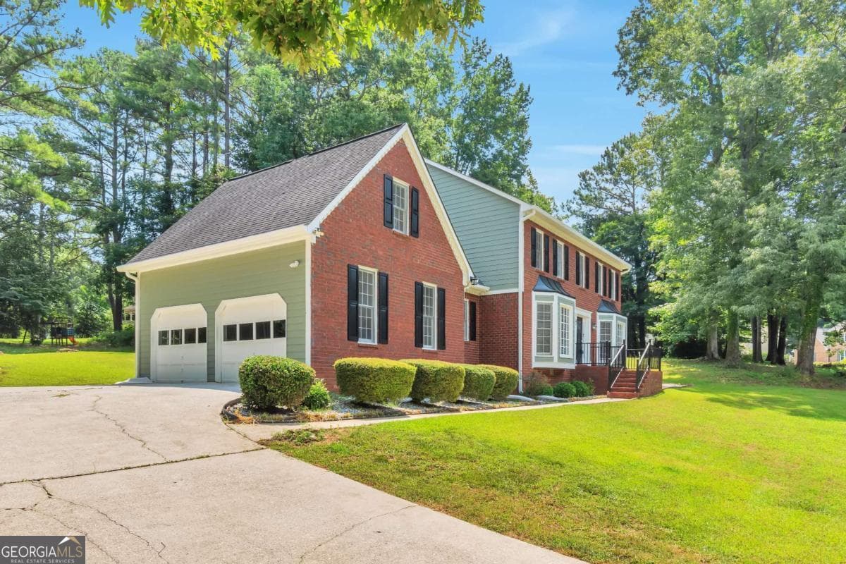 4 bedroom, 2.5 bathroom single family residence for sale at 1448 Red Fox Run, Lilburn, GA 30047 — photo 2