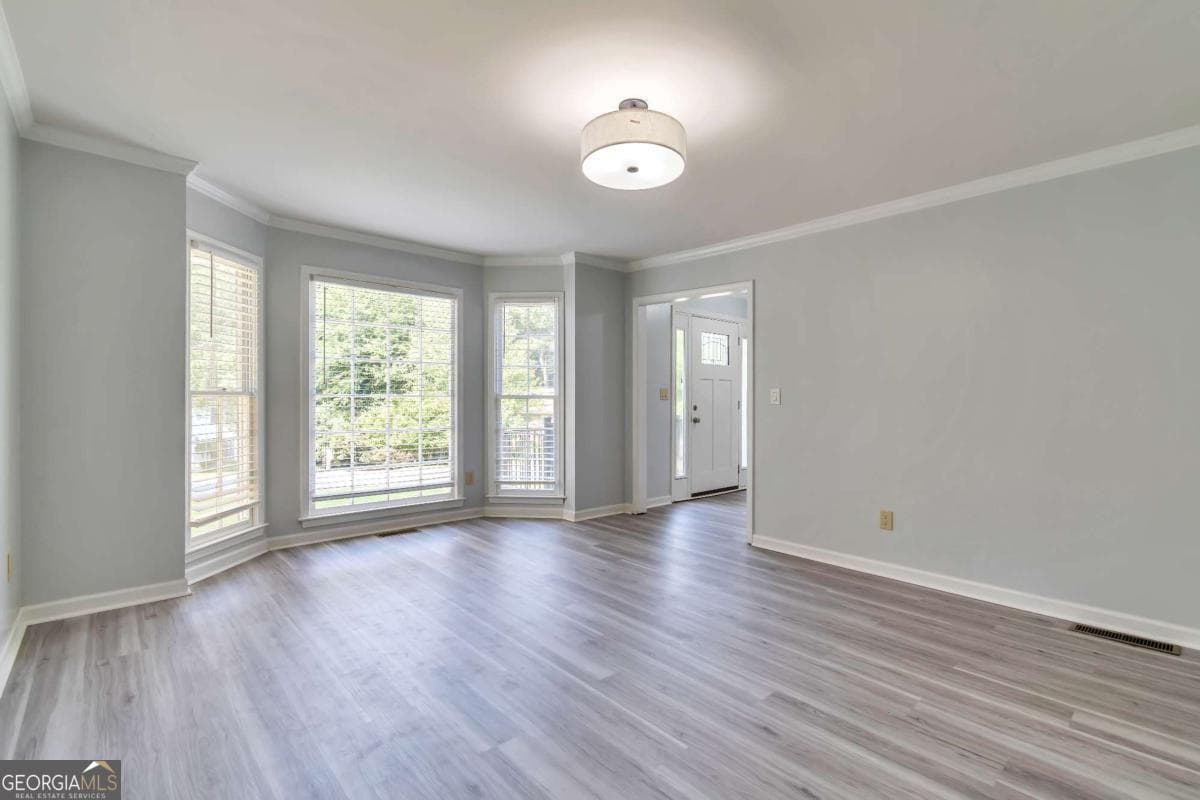 4 bedroom, 2.5 bathroom single family residence for sale at 1448 Red Fox Run, Lilburn, GA 30047 — photo 6
