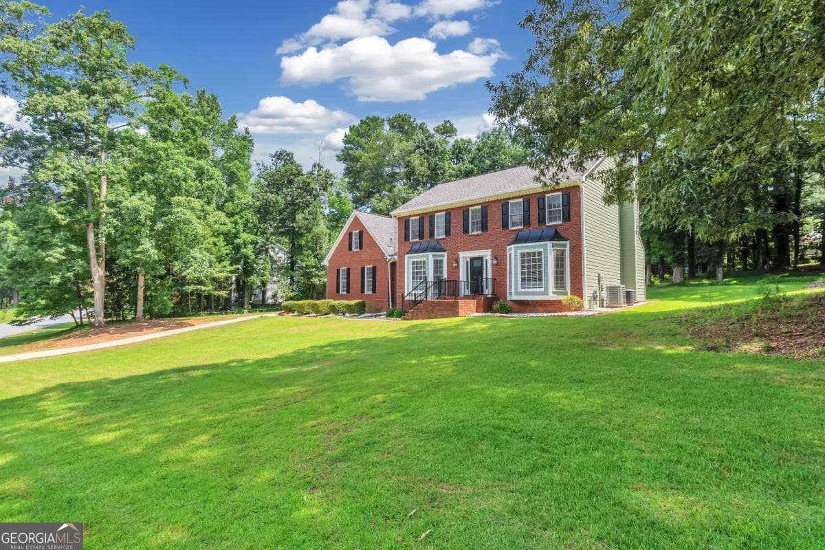 4 bedroom, 2.5 bathroom single family residence for sale at 1448 Red Fox Run, Lilburn, GA 30047 — photo 3