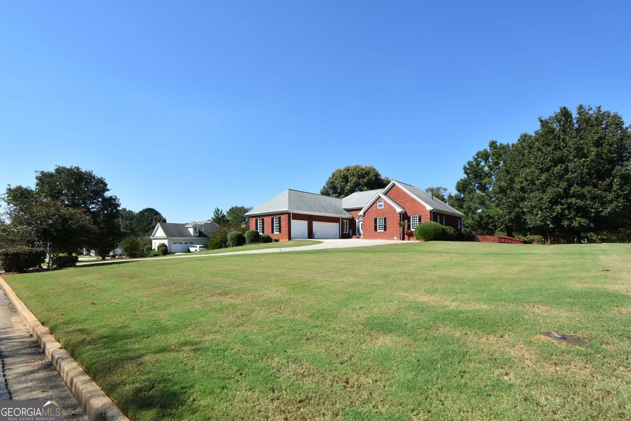 4 bedroom, 3 bathroom, 3,199 sq ft single family residence for sale at 1209 Dover Place, Conyers, GA 30013 — photo 5