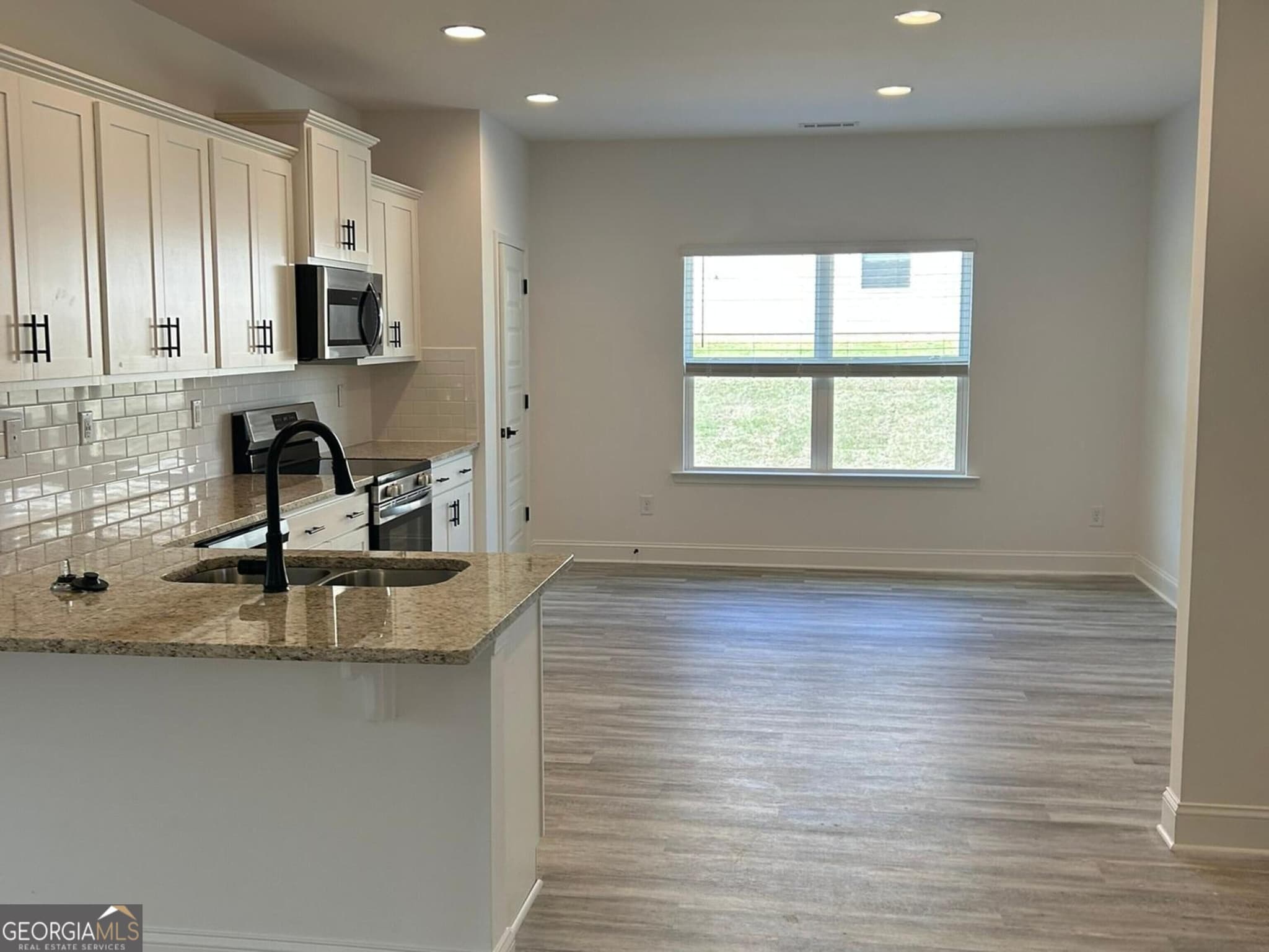 4 bedroom, 3 bathroom, 2,316 sq ft single family residence for sale at 1037 Holliday Pass 22, Griffin, GA 30223 — photo 5