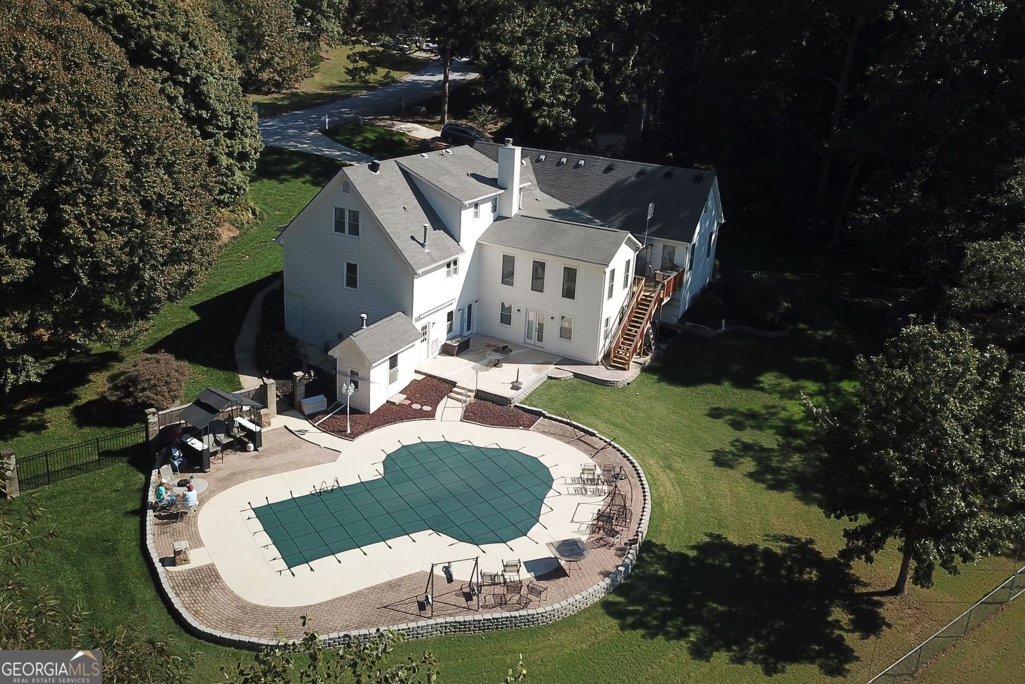 5 bedroom, 4.5 bathroom, 5,155 sq ft single family residence for sale at 2100 Oak Village Lane, Lawrenceville, GA 30043 — photo 2
