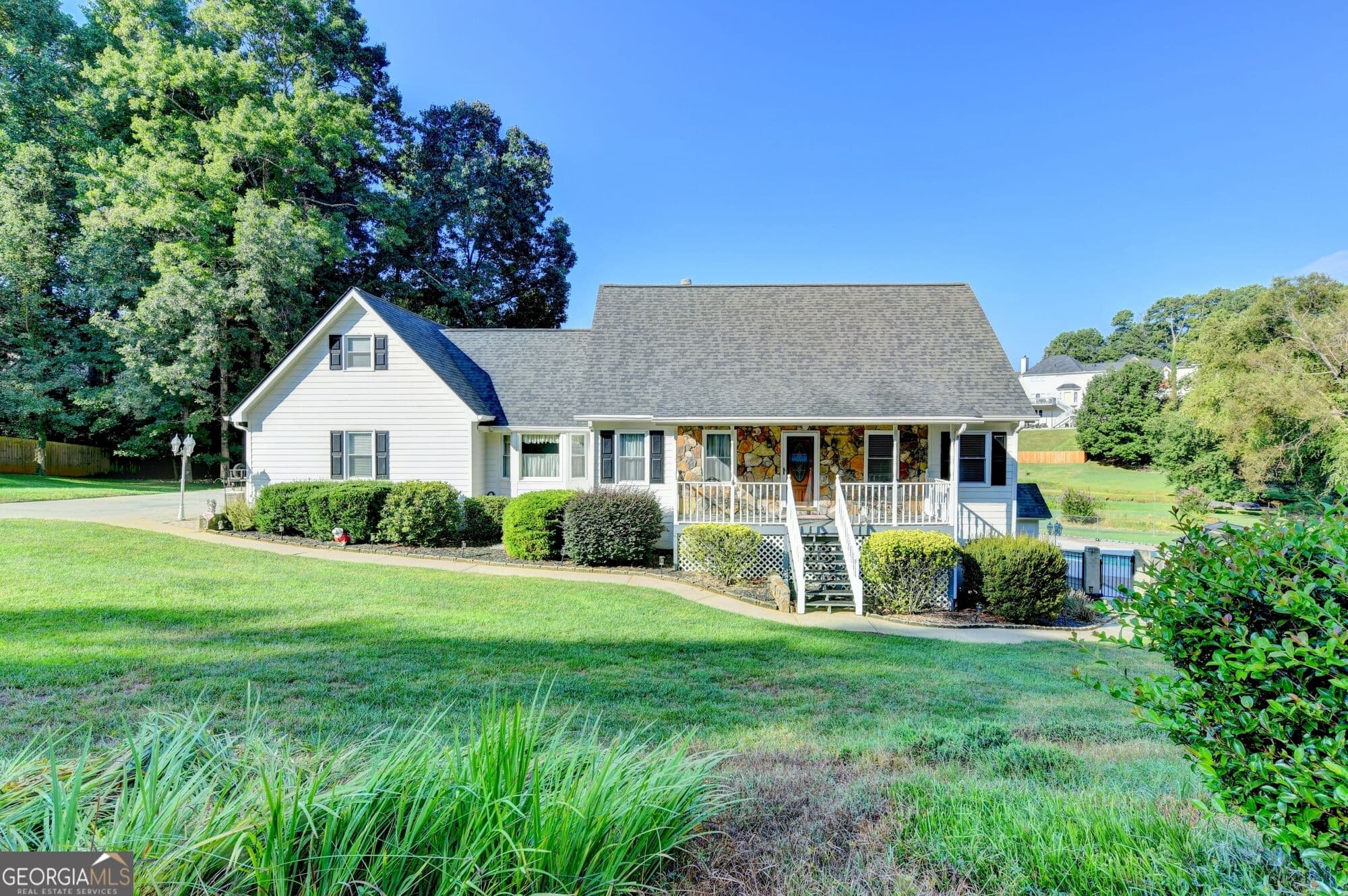 5 bedroom, 4.5 bathroom, 5,155 sq ft single family residence for sale at 2100 Oak Village Lane, Lawrenceville, GA 30043 — photo 3