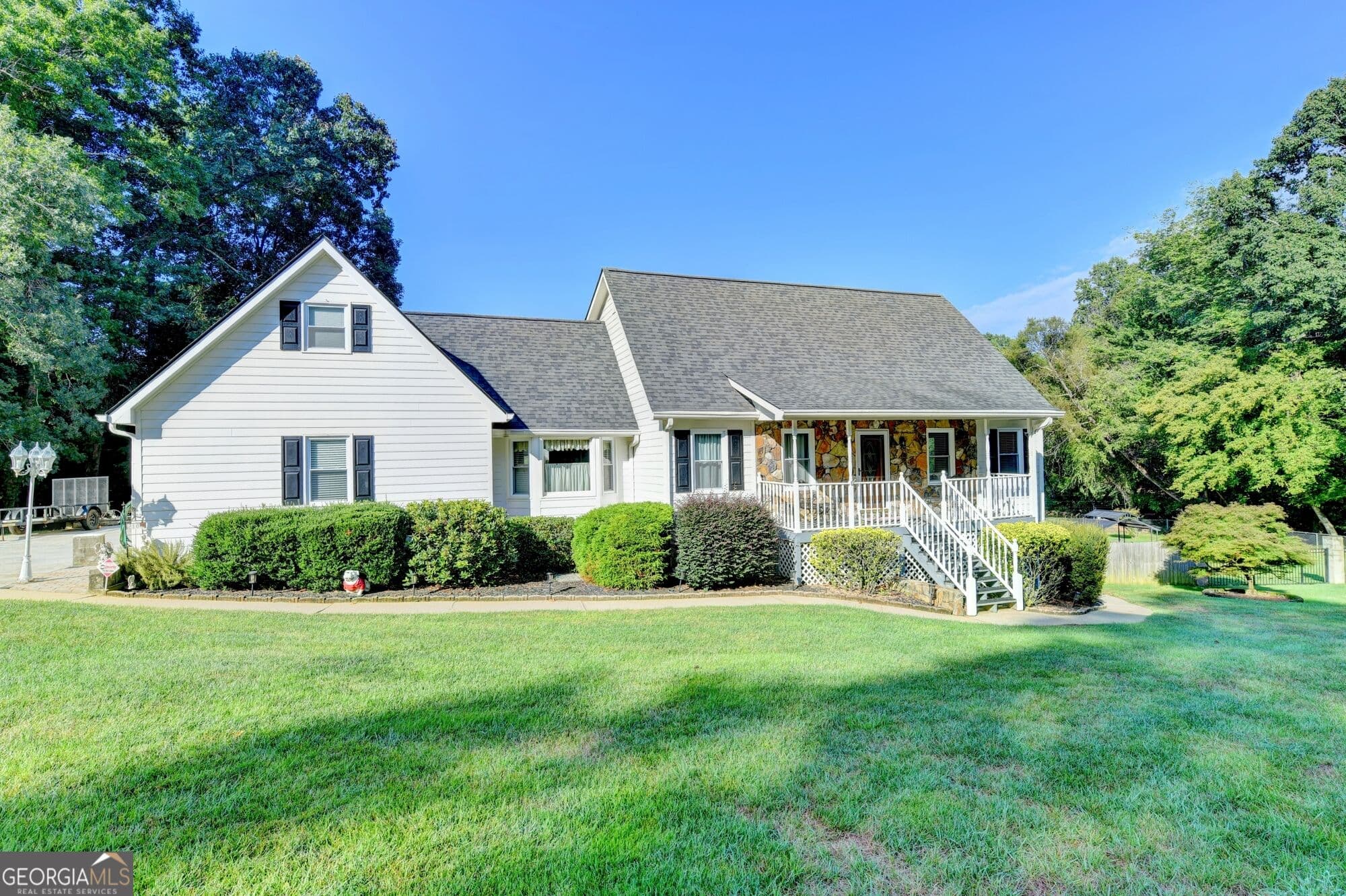 5 bedroom, 4.5 bathroom, 5,155 sq ft single family residence for sale at 2100 Oak Village Lane, Lawrenceville, GA 30043 — photo 1 of 75