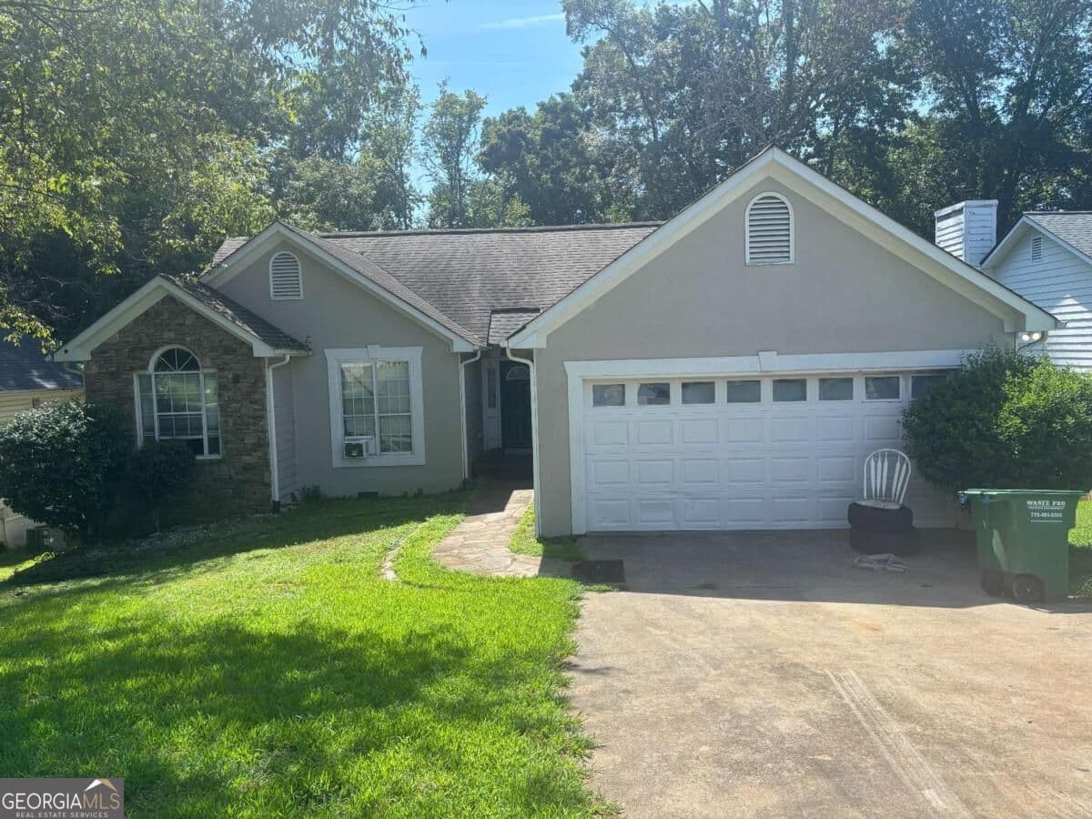 3 bedroom, 2 bathroom, 1,522 sq ft single family residence for sale at 2051 Boone Place, Snellville, GA 30078 — photo 1 of 6