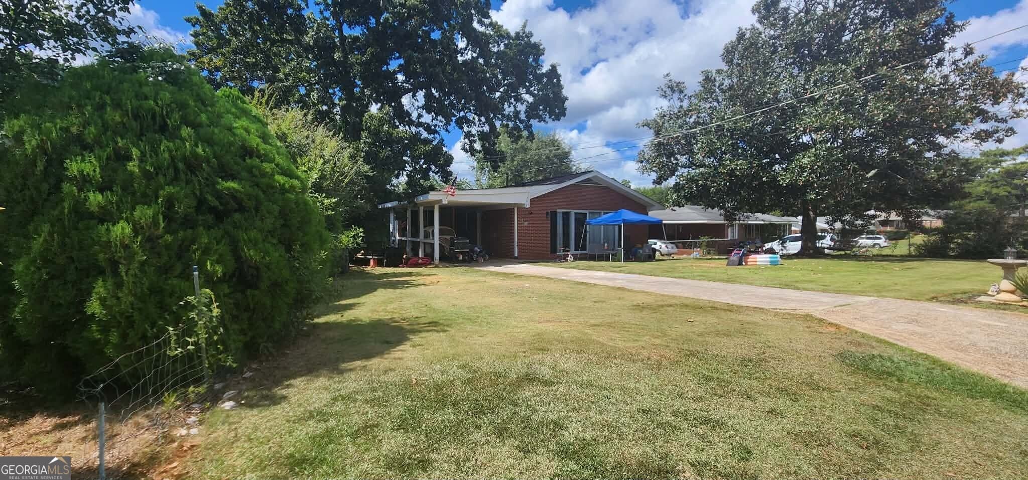 3 bedroom, 1 bathroom, 1,129 sq ft single family residence for sale at 605 Peachtree Drive, Thomaston, GA 30286 — photo 3