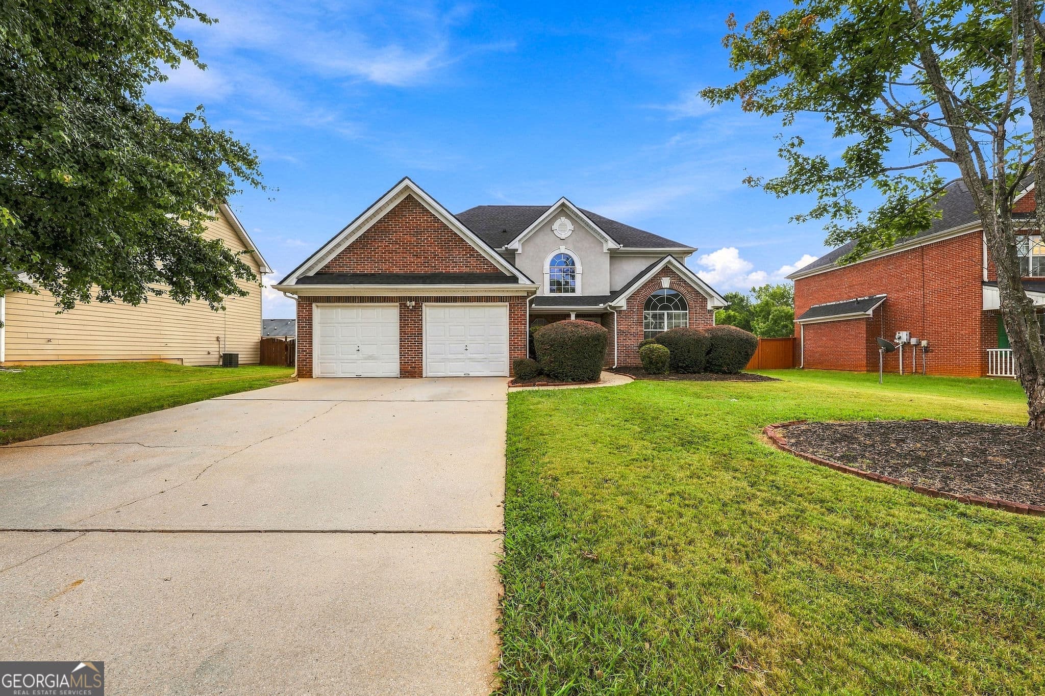 4 bedroom, 3 bathroom, 2,879 sq ft single family residence for sale at 1202 Polk Crossing, Mcdonough, GA 30252 — photo 2