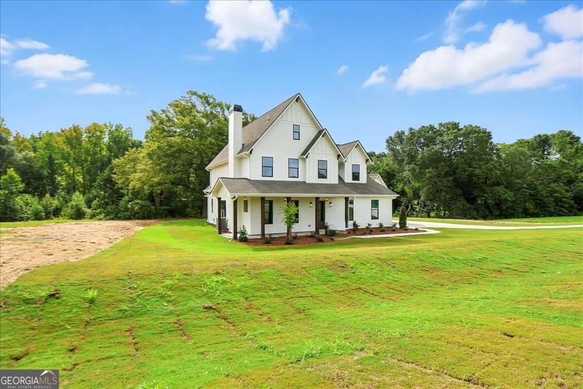 4 bedroom, 4.5 bathroom single family residence for sale at 95 Old Town Road, Dacula, GA 30019 — photo 4