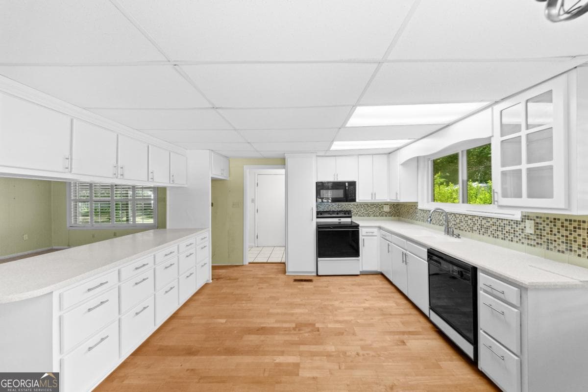 3 bedroom, 2 bathroom, 2,608 sq ft single family residence for sale at 34 Main Street, Register, GA 30452 — photo 3