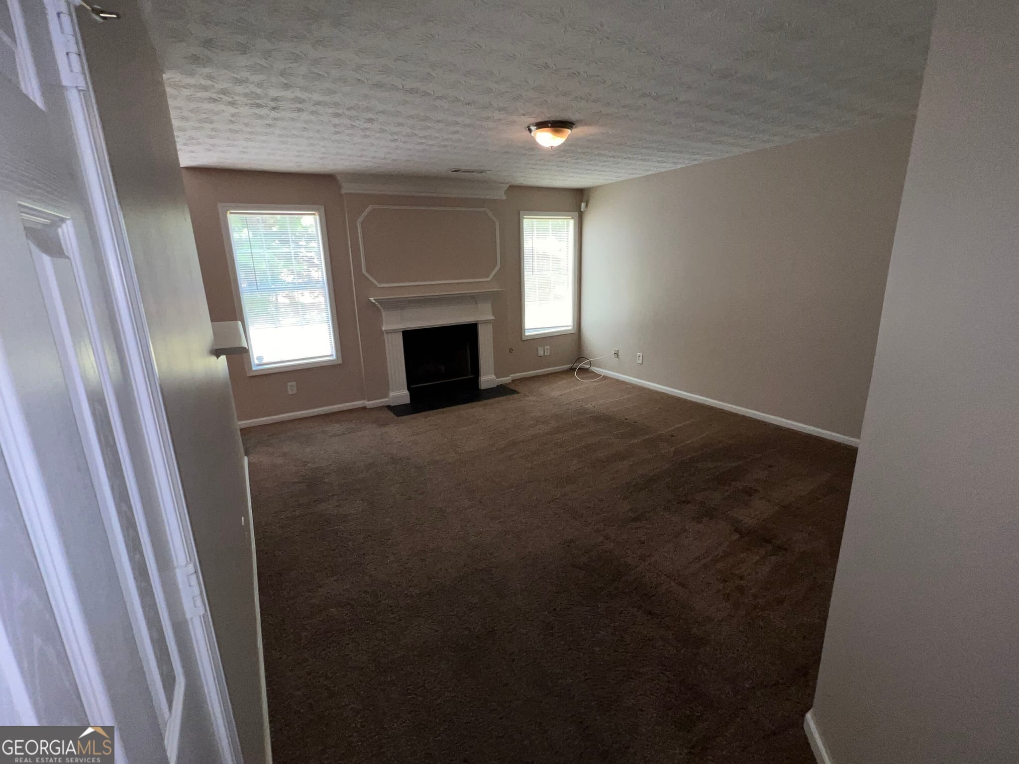 4 bedroom, 2.5 bathroom, 2,452 sq ft single family residence for sale at 3880 Button Gate Court, Lithonia, GA 30038 — photo 6