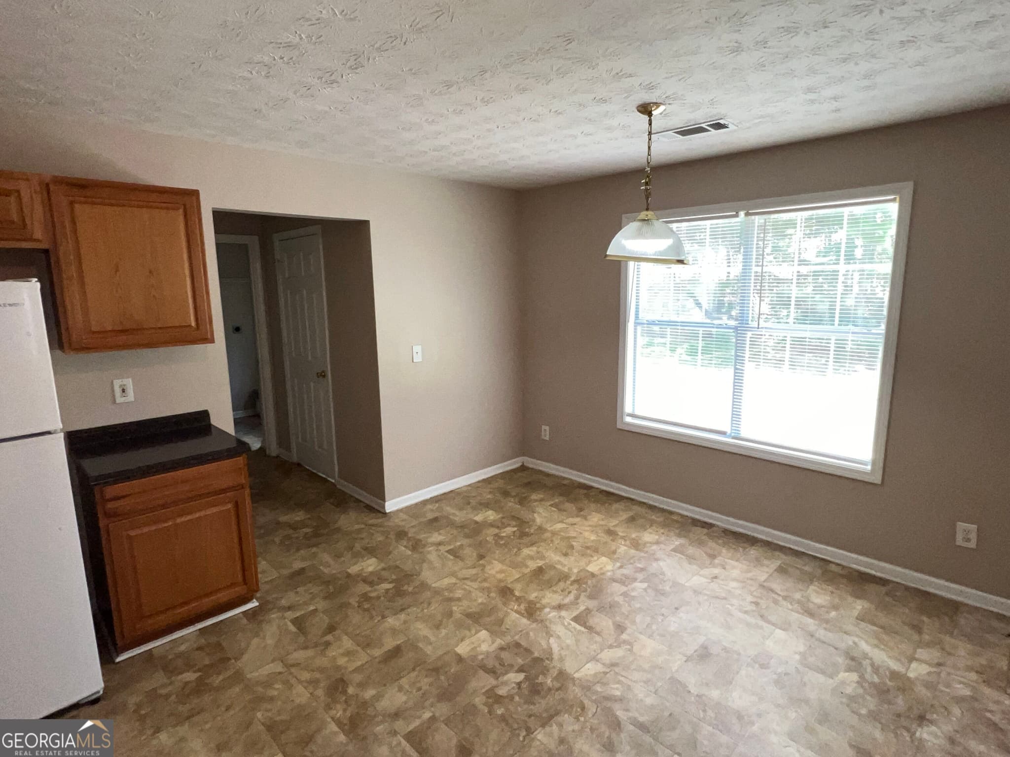 4 bedroom, 2.5 bathroom, 2,452 sq ft single family residence for sale at 3880 Button Gate Court, Lithonia, GA 30038 — photo 9