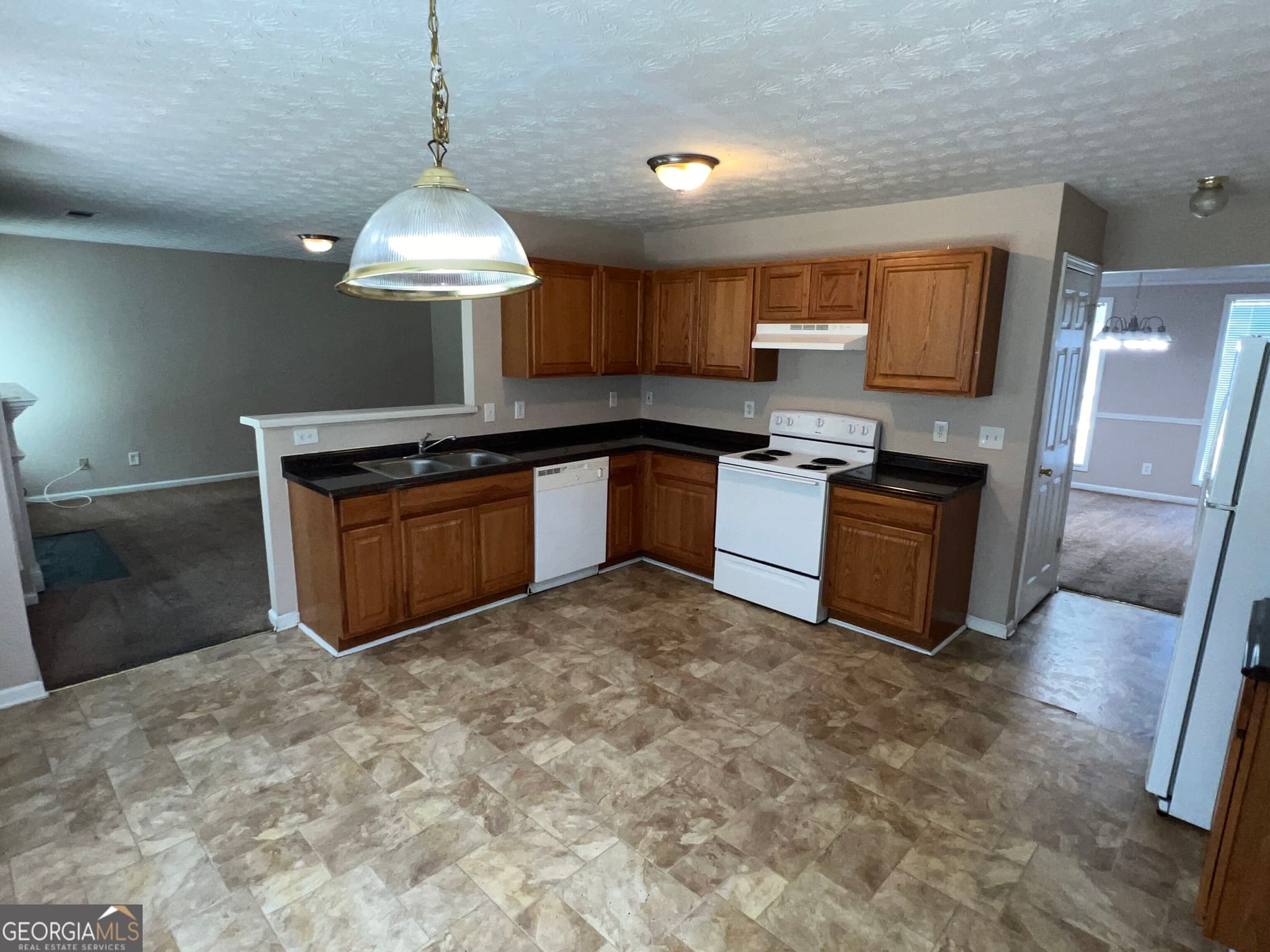 4 bedroom, 2.5 bathroom, 2,452 sq ft single family residence for sale at 3880 Button Gate Court, Lithonia, GA 30038 — photo 8
