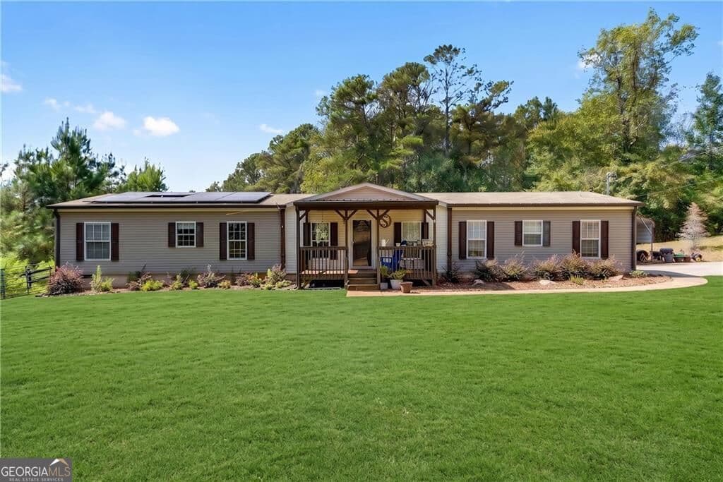 4 bedroom, 2 bathroom, 2,052 sq ft single family residence for sale at 4353 Flatbottom Road, Ball Ground, GA 30107 — photo 2