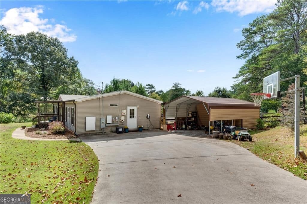 4 bedroom, 2 bathroom, 2,052 sq ft single family residence for sale at 4353 Flatbottom Road, Ball Ground, GA 30107 — photo 3