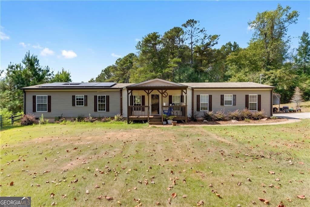 4 bedroom, 2 bathroom, 2,052 sq ft single family residence for sale at 4353 Flatbottom Road, Ball Ground, GA 30107