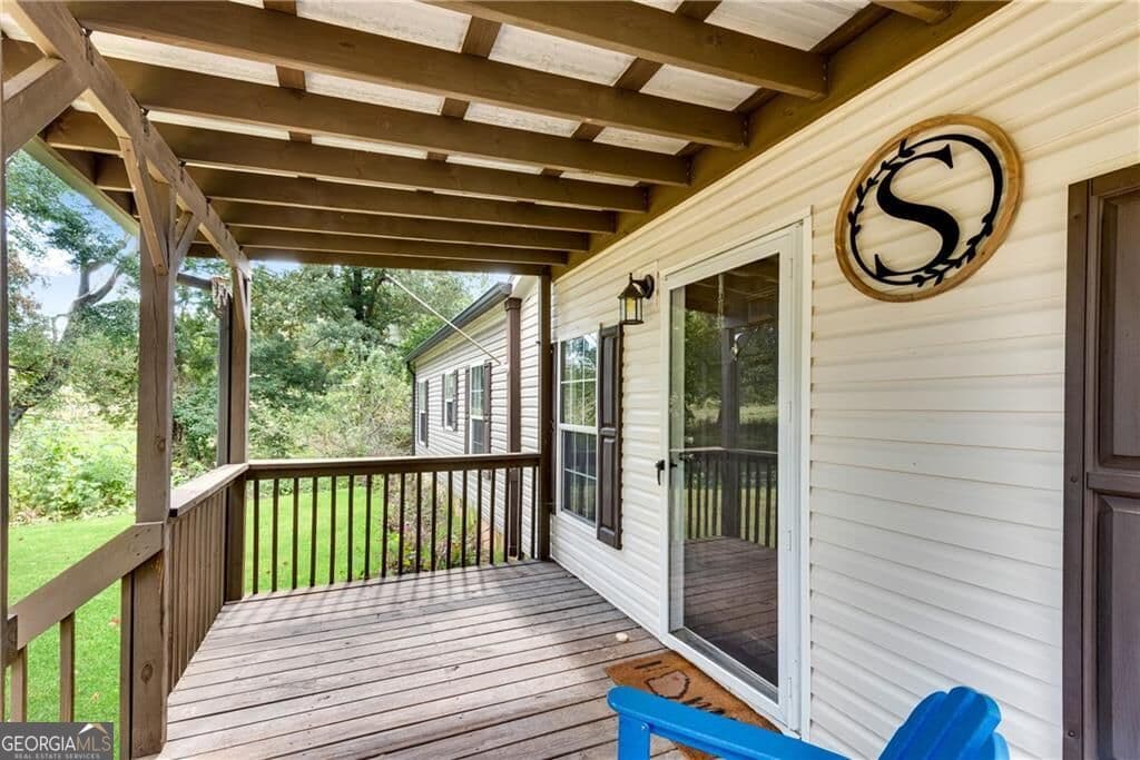4 bedroom, 2 bathroom, 2,052 sq ft single family residence for sale at 4353 Flatbottom Road, Ball Ground, GA 30107 — photo 5